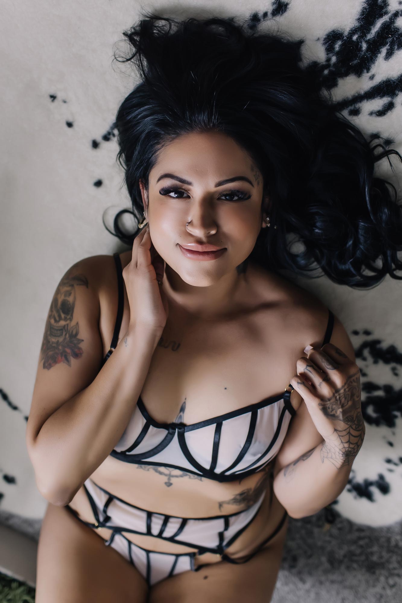 brunette woman in two piece lingerie looking at camera brunette woman in two piece lingerie looking at camera