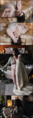 Curvy brunette in sage green two piece lingerie with bell sleeves.