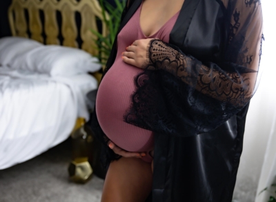 Pregnant Belly In Pink and Black Satin