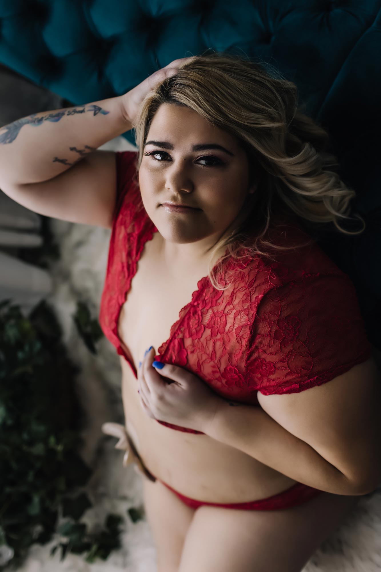beautiful woman with ostomy bag in red lingerie