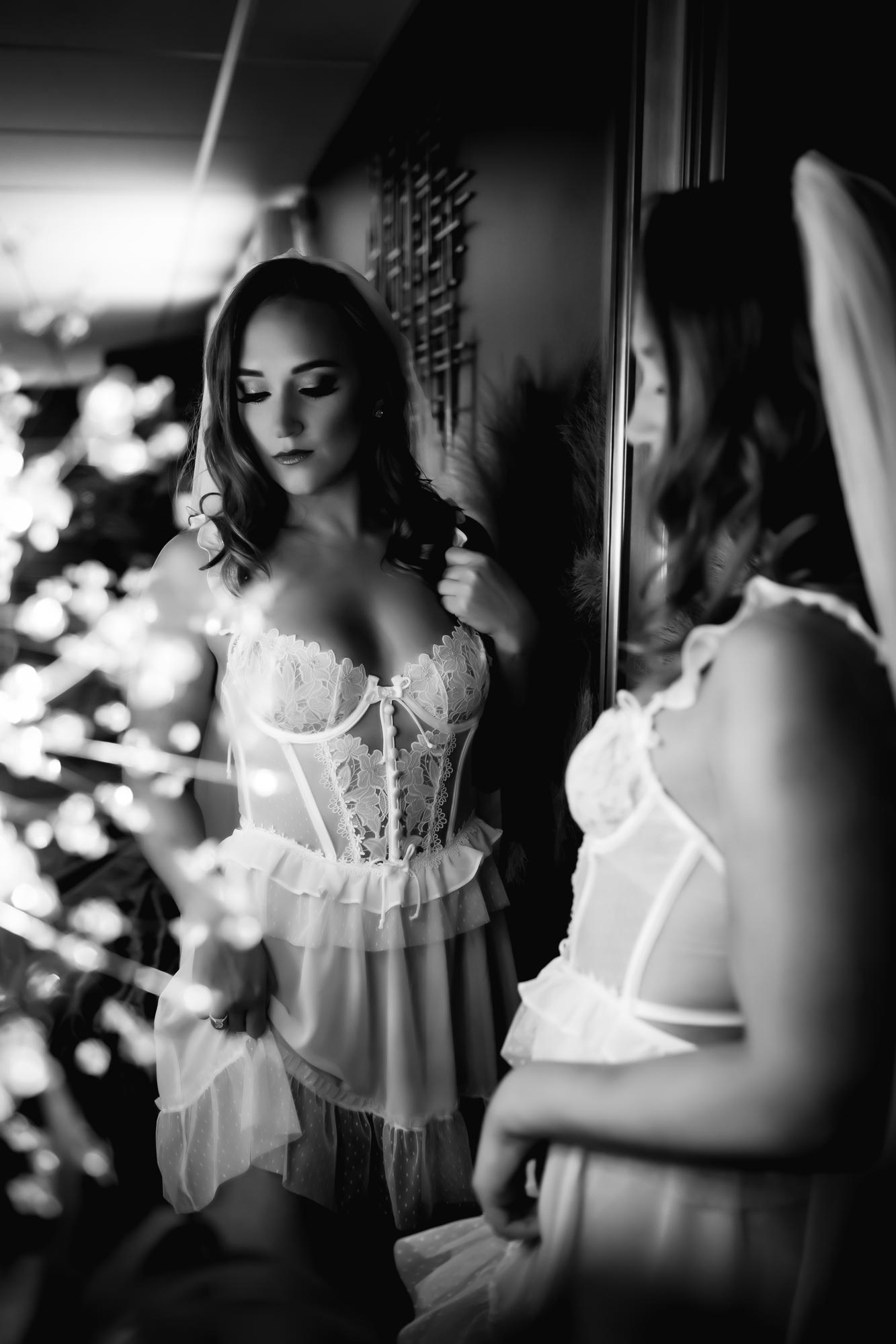 black and white image of woman in lingerie for her wedding